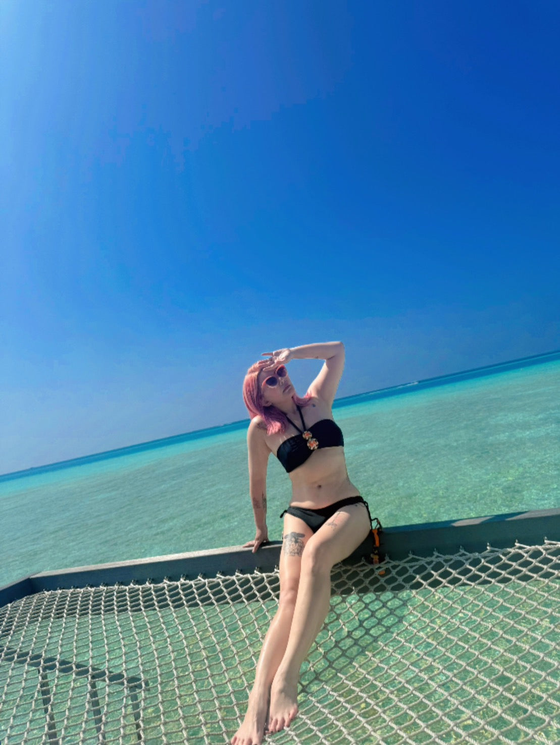 BHUSANAKAN SWIMWEAR บิกินี่รุ่น "Boho Breeze" บิกินี่สีดำ บราแต่งอะไหล่ลูกปัด และกางเกงแบบผูกข้างพร้อมพู่ห้อยแบบฟรุ้งฟริ้ง