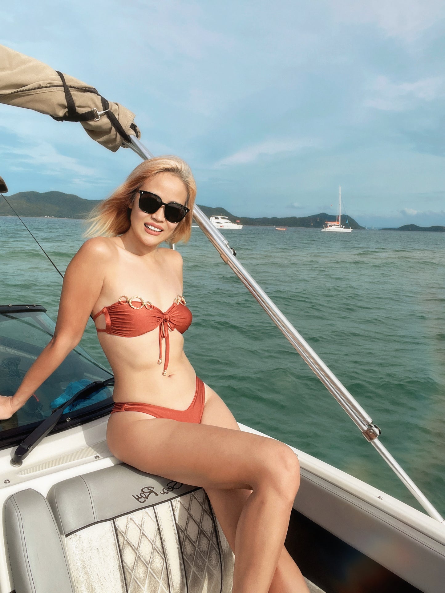 BHUSANAKAN SWIMWEAR บิกินี่รุ่น "Cinnamon Bittern" บิกินี่สีส้มอิฐ ผ้าว่ายน้ำ shiny แต่งห่วงทอง